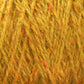 Close-up image of yellow and orange Harrisville Designs Harrisville Shetland Yarn - Unwashed Cones strands interwoven in a thick, textured pattern. The yarn appears fluffy with a blend of the two colors, creating a warm and cozy appearance suitable for Fair Isle knitting designs or crocheting lightweight blankets.