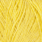 Close-up of a bundle of Einband Lopi yellow Icelandic wool yarn from Berroco, Inc. with visible fibers, showcasing its texture and twisted strands. The image highlights the bright, vibrant yellow color and the detailed structure of the yarn threads, perfect for lace knitting or intricate colorwork projects.