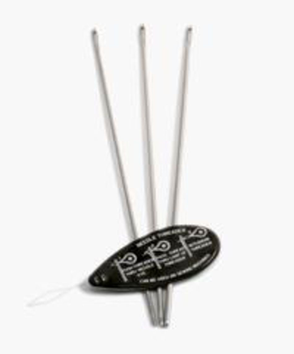 Three silver-colored tatting needles from the Handy Hands Tatting Needle Sets collection, featuring looped ends and arranged in a fan shape. Attached to them is a black elongated oval tag resembling a keychain, with white instructions printed on it. The needle sizes range from 0 through 9. The background is plain white.