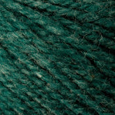 Close-up of the textured teal-colored Bartlett Maine Wool, Sport Weight Cone by Bartlettyarns, featuring interwoven fibers for a homespun appearance. The wool sports a slightly heathered look with specks of lighter and darker shades.